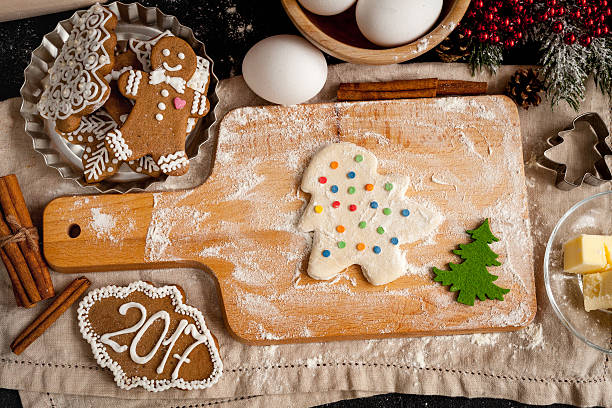 istock cooking christmas gingerbread on wooden background top view 625387380