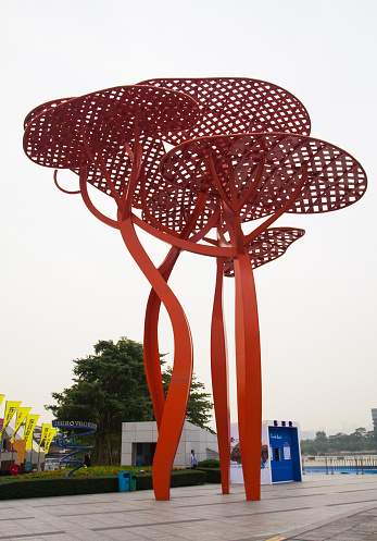 Shenzhen. China - November 11, 2016: Design art statue big red metallic figure in the form of plants on OCT harbor shenzhen. 
