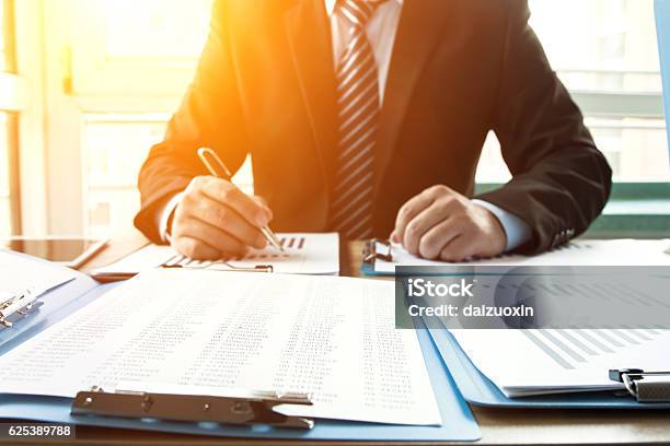 Businessman In The Office Stock Photo - Download Image Now - Financial Advisor, Advice, Wealth