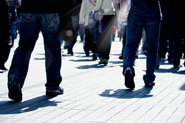 istock walking on busy street 625389798