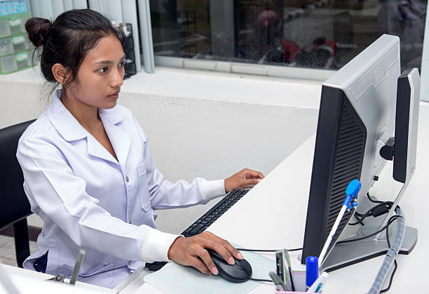 istock woman doctor working on computer 625389858