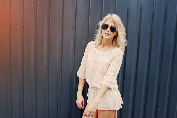 istock stylish girl blonde 625390818