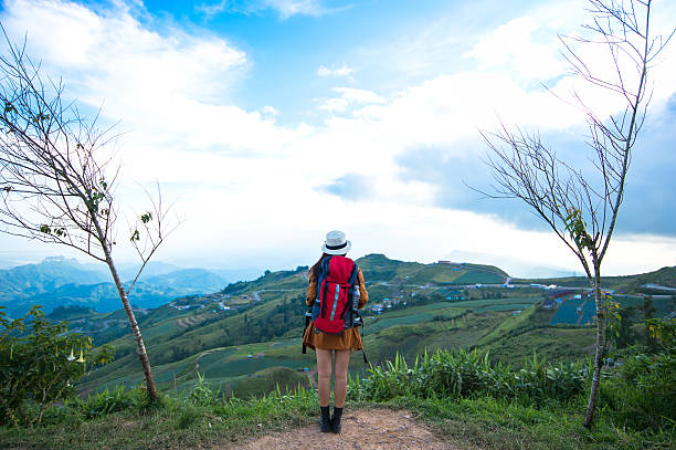 istock Hiker woman feeling victorious facing on the mountain 625408464
