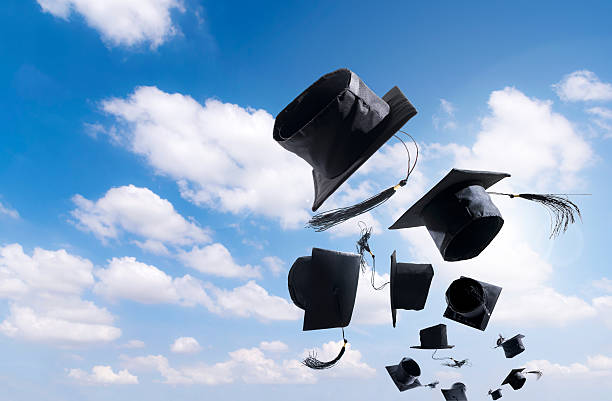 istock Graduation Ceremony, Graduation Caps, hat Thrown in the Air with 625408486