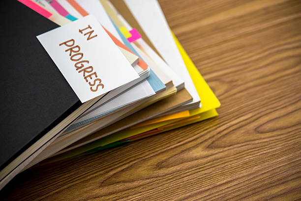 istock In Progress; The Pile of Business Documents on the Desk 625411096