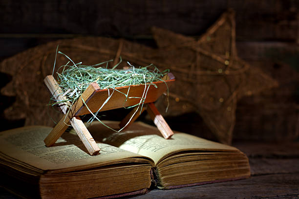 istock Birth of Jesus with manger on the bible 625412708