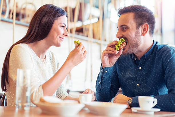 istock Beautiful young couple sitting in a cafe 625412790