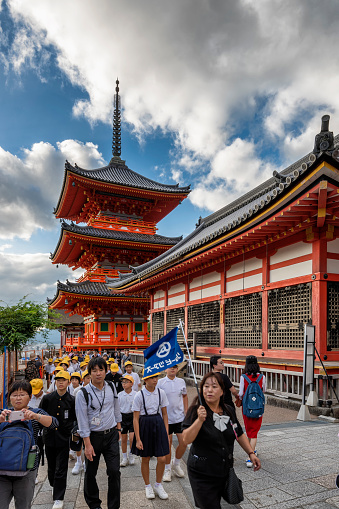 Kyoto, Japan - October 6, 2016: Entrance of Fushimi Inari Shrine full of tourists.