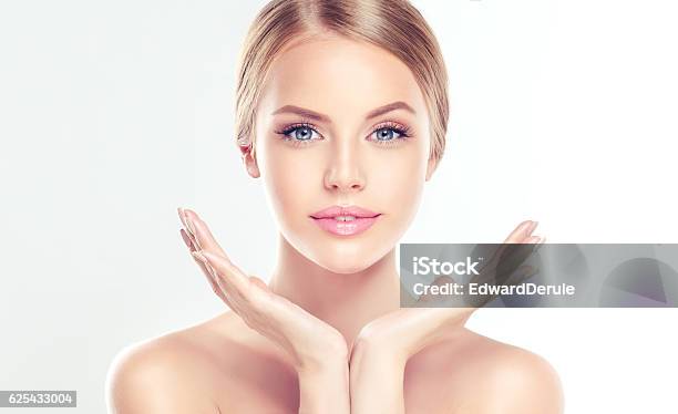 Young Woman With Clean Fresh Skin Stock Photo - Download Image Now - Human Face, Beauty, Fashion Model