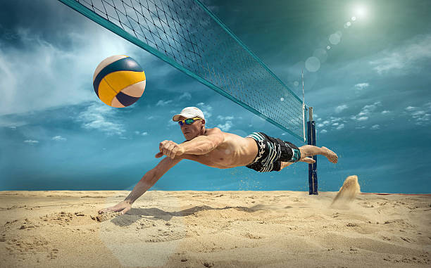 istock Beach volleyball player in action at sunny day under sky. 625433722
