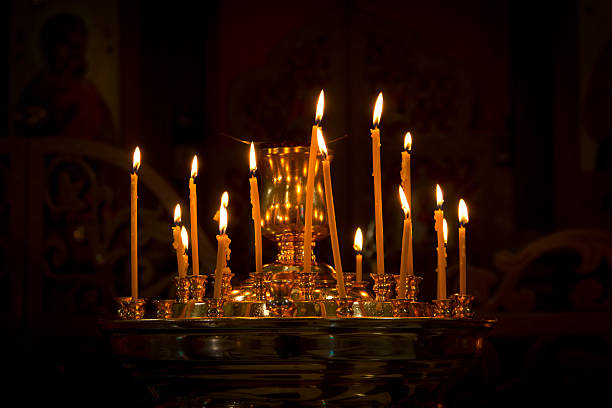 istock Christmas candles burning in the Golden candlestick 625434366