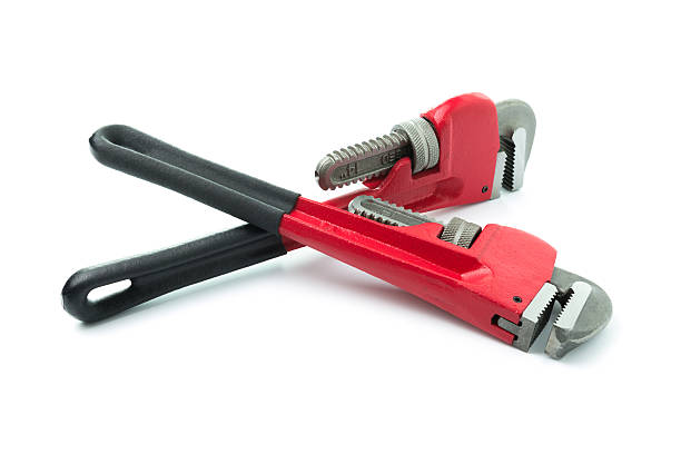 rosso pipe wrench - adjustable wrench wrench clipping path red foto e immagini stock