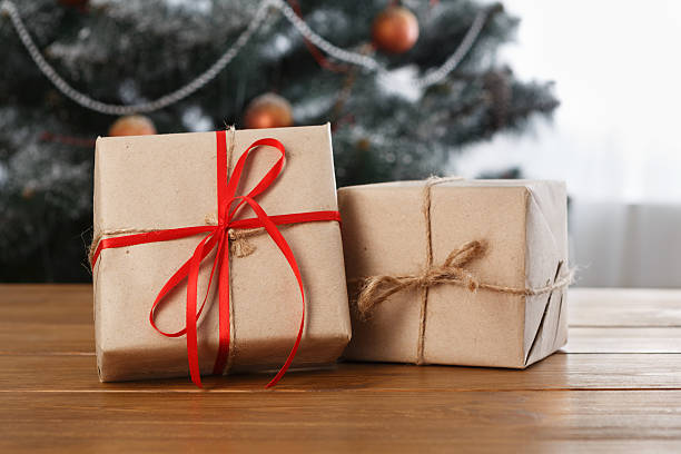 istock Christmas present on decorated room background, holiday concept 625442576