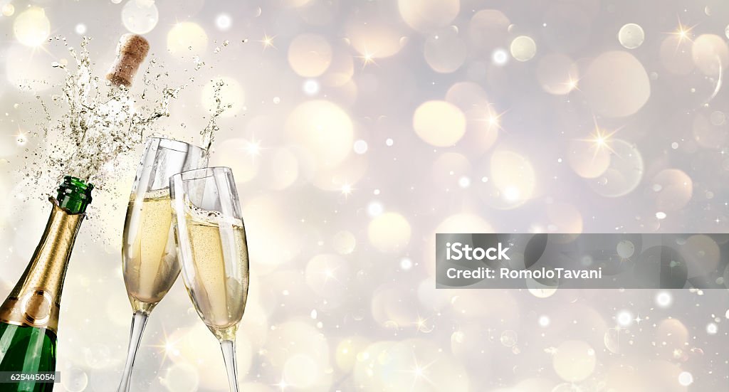 Champagne Explosion With Toast Of Flutes Champagne Stock Photo