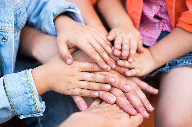 istock Family holding their hands together 625445254