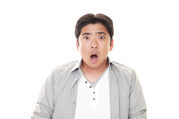 Surprised man Surprised Asian man isolated on white background surprised men stock pictures, royalty-free photos & images