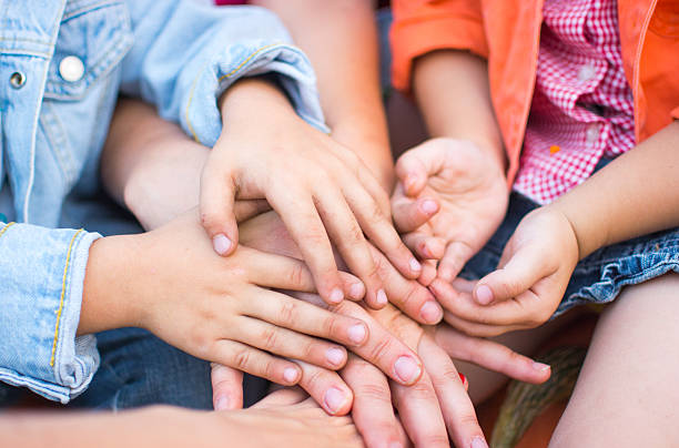 istock Family holding their hands together 625450876