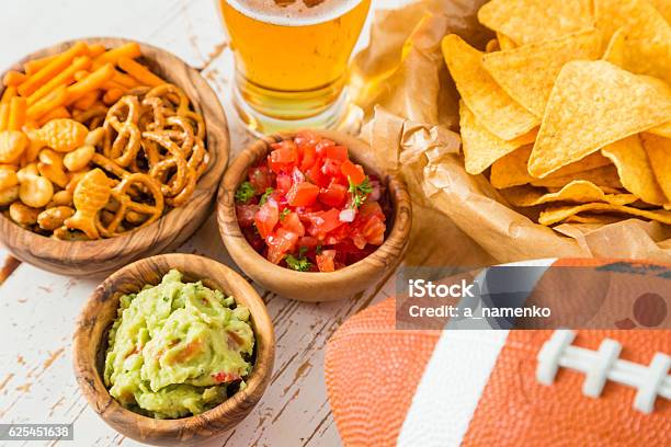 Football Party Food Nachos Salsa Guacamole Stock Photo - Download Image Now - Party - Social Event, Food, Snack