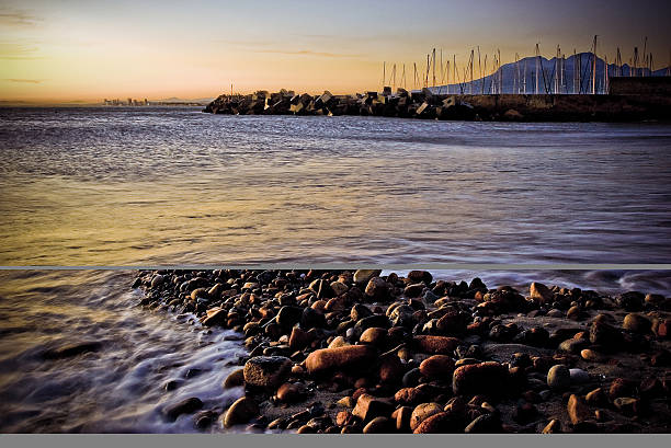 Gordon's Bay Sunset Gordon's Bay Sunset rocks motion, Cape town South Africa gordons bay stock pictures, royalty-free photos & images