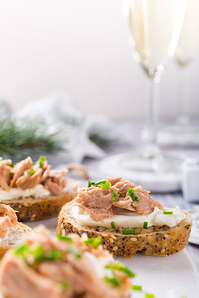 istock Slices of baguette with fresh tuna 625457020