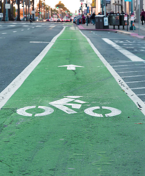 istock Bike lane painted in green 625457908