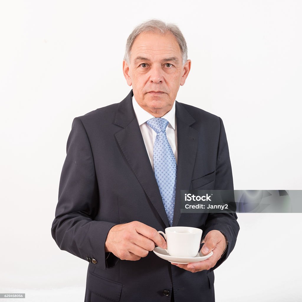 Man as an official, representative, agent or salesman Man as an official, representative, agent or salesman with coffee cup Blue Stock Photo
