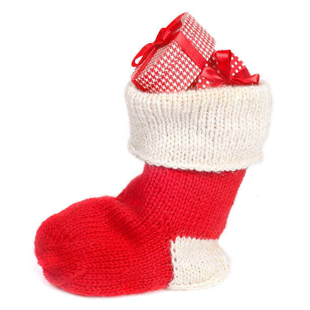 istock Christmas sock with gifts 625467124