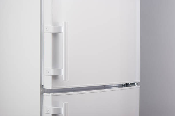 istock Close up of white refrigerator on gray 625467966