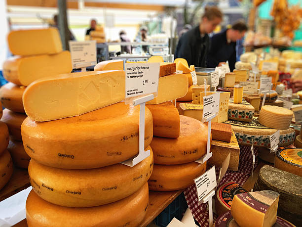 Noordermarkt farmer's market in Amsterdam Amsterdam, the Netherlands - April 16, 2016: The Noordermarkt farmer's market is located in the Jordaan  neighborhood of Amsterdam in the Netherlands. Farmer's market are held on the square every Monday. cheese market stock pictures, royalty-free photos & images
