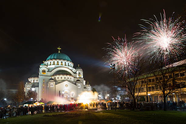 New Year's fireworks New Year's Eve celebration whit fireworks over the Church of Saint Sava. long exposure winter crowd blurred motion stock pictures, royalty-free photos & images