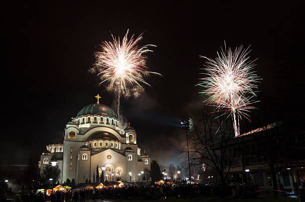 New Year's fireworks New Year's Eve celebration whit fireworks over the Church of Saint Sava. long exposure winter crowd blurred motion stock pictures, royalty-free photos & images