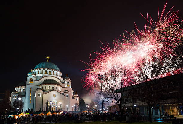 New Year's fireworks New Year's Eve celebration whit fireworks over the Church of Saint Sava. long exposure winter crowd blurred motion stock pictures, royalty-free photos & images