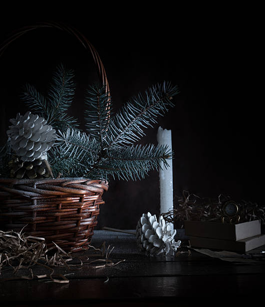 istock christmas, new year. basket with fir branches and cones on 625472832
