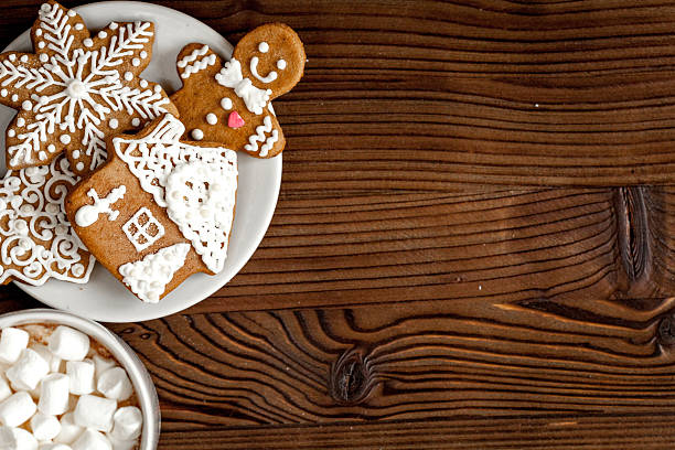 istock Christmas gingerbread, spruce branches on wooden background top view 625473204