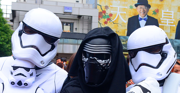 Tokyo, Japan - October 30, 2016: Halloween in Shibuya, Tokyo, Japan. Young people wear Imperial Stromtrooper and Kylo Ren dress from Star Wars for Halloween.