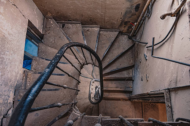 istock Old staircase of an abandoned house 625483766
