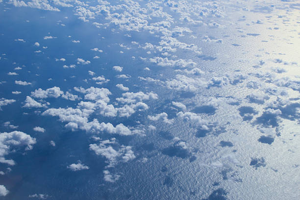 istock Clouds and ocean seen from airplne 625491832