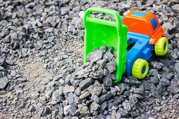 istock tipper truck unload crushed rocks 625492664