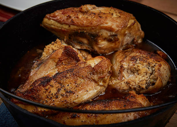 istock dutch oven roast chicken breast 625492884