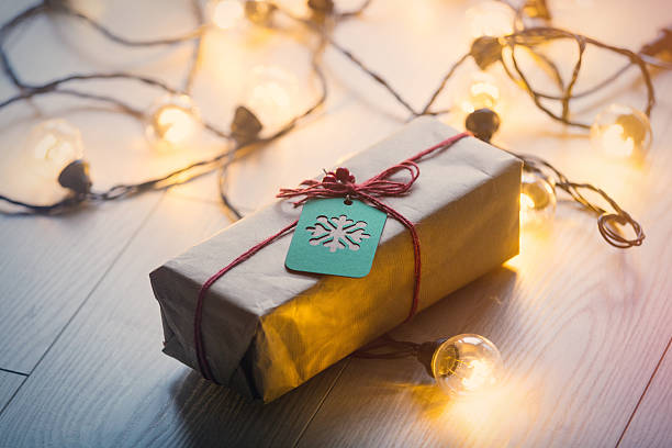 istock Christmas gift and fairy lights 625499172
