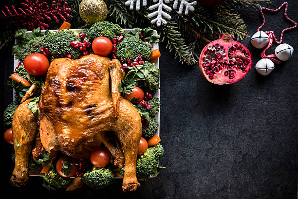 istock Christmas roasted chicken on the table 625501956