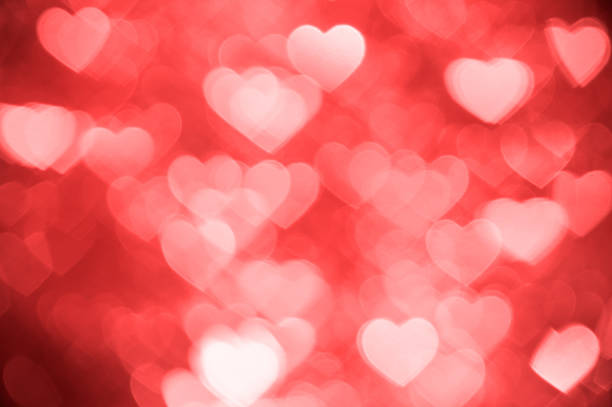 istock light red heart bokeh background photo, abstract holiday backdrop 625503640