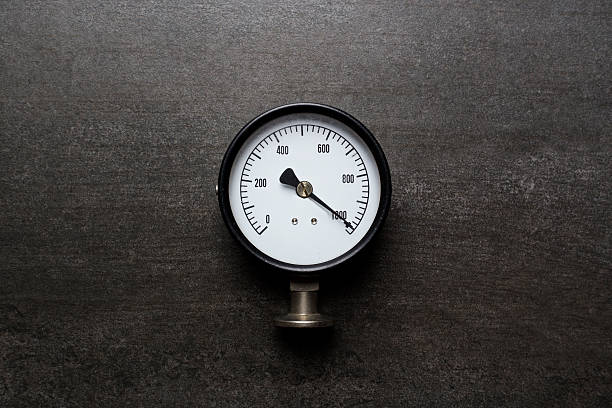 istock old pressure gauge on black background 625503812
