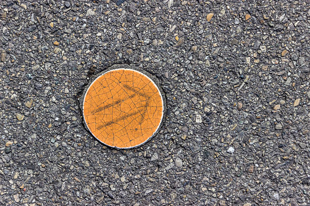 Arrow direction sign on the ground