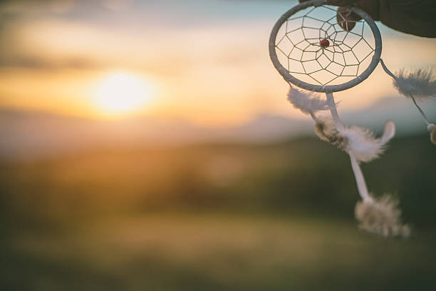 Dream catcher against the rising sun