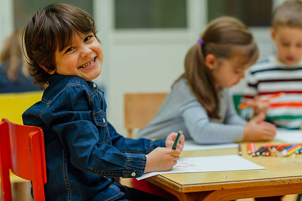 istock Happy Little Boy In Kindergarten 625507520