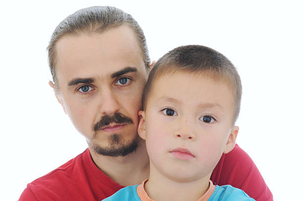 istock Dad and son together portrait isolated 625508140