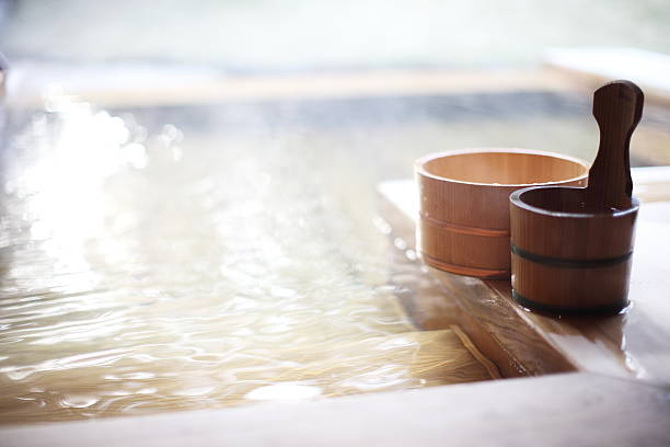 Wooden bucket by a Japanese hot spring bath