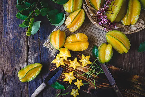 Yellow Starfruits on the old wood