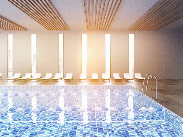 istock Side view of sunlit public pool 625555350